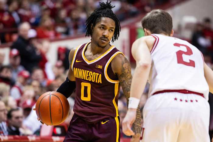 Elijah Hawkins dribbles